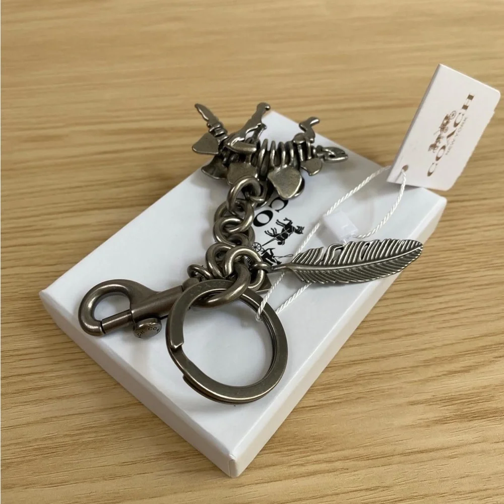 Coach Silver-Tone Stegosaurus & Feather Keyring Charm